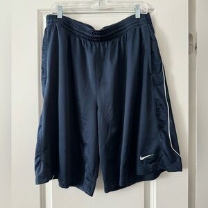 Nike men’s basketball shorts. Size XXL. Navy blue with white detail. Like new!